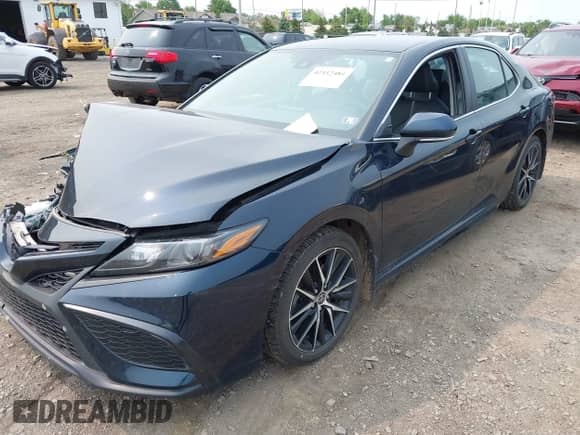 2021 Toyota Camry SE with VIN 4T1T11BKXMU020152, listed as a IAAI auction lot 42412484 with 39,274 mi miles and . Bid and sale history available at DreamBid. Image 17.