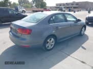 ✅ 2013 Volkswagen Jetta Hybrid SE • VIN: 3VW637AJ3DM305798 • Lot: 42736297. Listed on IAAI with 156,972 mi. Free auction sales archive from the USA and detailed vehicle history report at DreamBid. Image 4.