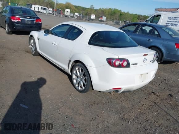 ✅ 2009 Mazda RX-8 Grand Touring • VIN: JM1FE17P790402552 • Lot: 42102535. Listed on IAAI with 105,869 mi. Free auction sales archive from the USA and detailed vehicle history report at DreamBid. Image 3.