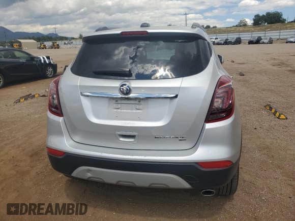✅ 2021 Buick Encore Preferred • VIN: KL4CJESM0MB365225 • Лот: 68043335. Опубликован ранее на Copart с пробегом 85 853 миль. Бесплатный доступ к архиву аукционных продаж из США и подробный отчёт об истории автомобиля на DreamBid. Изображение 6.