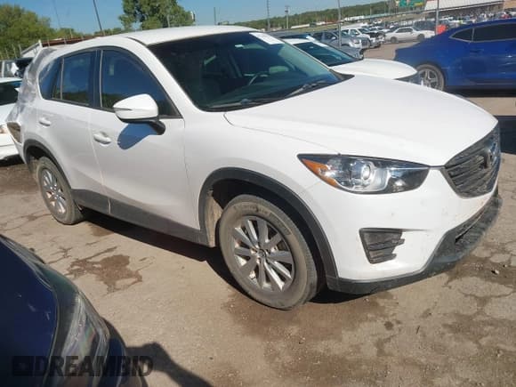 ✅ 2016 Mazda CX-5 Sport • VIN: JM3KE4BYXG0917498 • Lot: 43244914. Listed on IAAI with 112,801 mi. Free auction sales archive from the USA and detailed vehicle history report at DreamBid. Image 1.