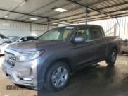 ✅ 2025 Honda Ridgeline RTL • VIN: 5FPYK3F50SB041449 • Lot: 86894365. Wystawiony na Copart z przebiegiem 849 mil. Bezpłatny archiwum sprzedaży aukcyjnych z USA i szczegółowy raport historii pojazdu na DreamBid. Zdjęcie 1.