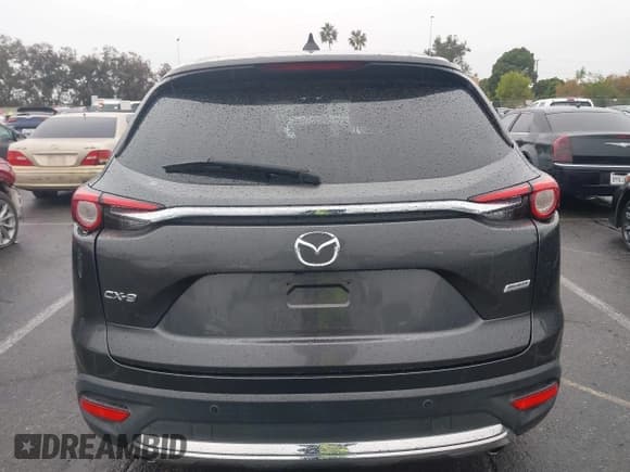 ✅ 2018 Mazda CX-9 Grand Touring • VIN: JM3TCADY5J0203551 • Лот: 43692628. Опубликован ранее на IAAI с пробегом 89 454 миль. Бесплатный доступ к архиву аукционных продаж из США и подробный отчёт об истории автомобиля на DreamBid. Изображение 16.