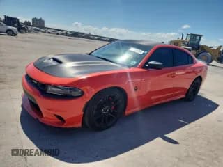 ✅ 2021 Dodge Charger Scat Pack • VIN: 2C3CDXGJXMH511374 • Lot: 81286565. Wystawiony na Copart z przebiegiem 51 427 mil. Bezpłatny archiwum sprzedaży aukcyjnych z USA i szczegółowy raport historii pojazdu na DreamBid. Zdjęcie 1.