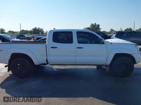 ✅ 2015 Toyota Tacoma PreRunner • VIN: 5TFKU4HN6FX006874 • Lot: 43090148. Listed on IAAI with 182,527 mi. Free auction sales archive from the USA and detailed vehicle history report at DreamBid. Image 13.