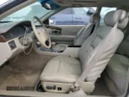 ✅ 1999 Cadillac Eldorado • VIN: 1G6EL12Y7XU615169 • Лот: 76459744. Опубликован ранее на Copart с пробегом Не указан. Бесплатный доступ к архиву аукционных продаж из США и подробный отчёт об истории автомобиля на DreamBid. Изображение 7.