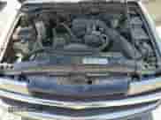 1999 Chevrolet Blazer LS z VIN 1GNDT13W4X2176778, wystawiony jako Copart lot #61965294 z przebiegiem 196 511 mil mil oraz Szkoda całkowita • Salvage title. Historia ofert i sprzedaży dostępna na DreamBid. Obrazek 12.