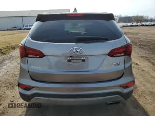 ✅ 2018 Hyundai Santa Fe 2.4L • VIN: 5NMZUDLB1JH067059 • Лот: 44322014. Опубликован ранее на Copart с пробегом 103 429 миль. Бесплатный доступ к архиву аукционных продаж из США и подробный отчёт об истории автомобиля на DreamBid. Изображение 6.