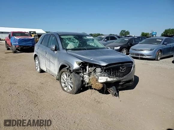 ✅ 2014 Mazda CX-5 Grand Touring • VIN: JM3KE4DY1E0426327 • Лот: 70492415. Опубликован ранее на Copart с пробегом 177 180 миль. Бесплатный доступ к архиву аукционных продаж из США и подробный отчёт об истории автомобиля на DreamBid. Изображение 13.