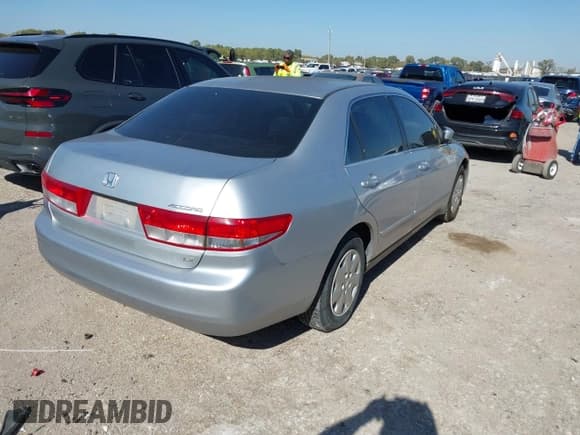 ✅ 2003 Honda Accord LX • VIN: 3HGCM56353G702915 • Lot: 43633186. Listed on IAAI with 123,891 mi. Free auction sales archive from the USA and detailed vehicle history report at DreamBid. Image 4.
