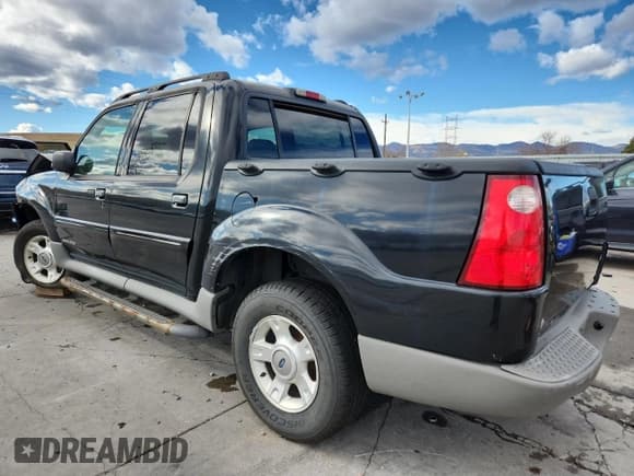 ✅ 2001 Ford Explorer Sport Trac • VIN: 1FMZU77E11UA94241 • Lot: 92632475. Listed on Copart with 197,488 mi. Free auction sales archive from the USA and detailed vehicle history report at DreamBid. Image 2.