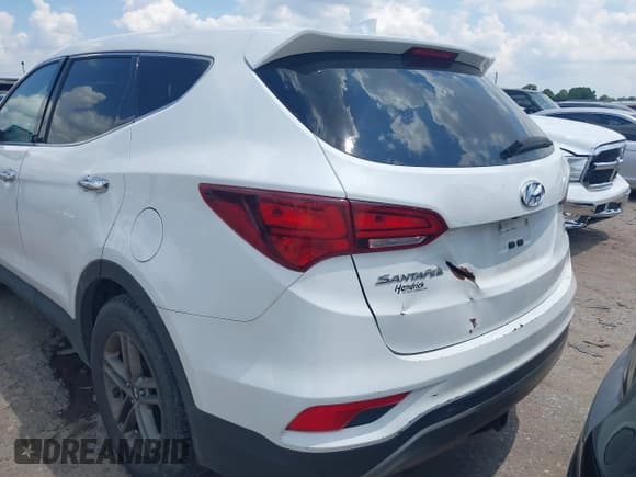 ✅ 2017 Hyundai Santa Fe 2.4L • VIN: 5XYZTDLB4HG399827 • Lot: 42831203. Wystawiony na IAAI z przebiegiem 173 312 mil. Bezpłatny archiwum sprzedaży aukcyjnych z USA i szczegółowy raport historii pojazdu na DreamBid. Zdjęcie 3.