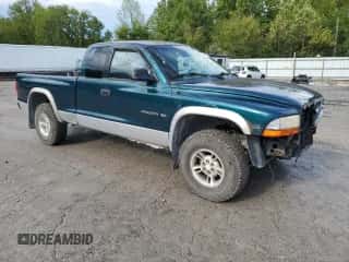 1999 Dodge Dakota SLT z VIN 1B7GG22Y1XS285749, wystawiony jako Copart lot #73038674 z przebiegiem 153 048 mil mil oraz Szkoda całkowita • Salvage title. Historia ofert i sprzedaży dostępna na DreamBid. Obrazek 4.