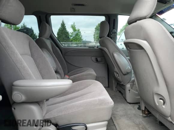 2002 Dodge Caravan EX with VIN 2B8GP74L42R567968, listed as a Copart auction lot 56639355 with 168,252 mi miles and Salvage title. Bid and sale history available at DreamBid. Image 11.