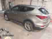 2017 Hyundai Santa Fe 2.0T z VIN 5XYZUDLA4HG424259, wystawiony jako IAAI lot #42657783 z przebiegiem 213 040 mil mil oraz . Historia ofert i sprzedaży dostępna na DreamBid. Obrazek 3.