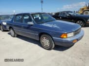 ✅ 1993 Dodge Spirit • VIN: 1B3XA46K0PF638477 • Lot: 75710534. Listed on Copart with 50,637 mi. Free auction sales archive from the USA and detailed vehicle history report at DreamBid. Image 4.