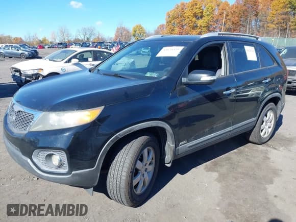 ✅ 2011 Kia Sorento LX • VIN: 5XYKTCA18BG060954 • Lot: 43625329. Listed on IAAI with 202,886 mi. Free auction sales archive from the USA and detailed vehicle history report at DreamBid. Image 2.
