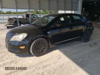 ✅ 2012 Suzuki Kizashi SE • VIN: JS2RF9A36C6100808 • Лот: 67488445. Опубликован ранее на Copart с пробегом 182 444 миль. Бесплатный доступ к архиву аукционных продаж из США и подробный отчёт об истории автомобиля на DreamBid. Изображение 1.