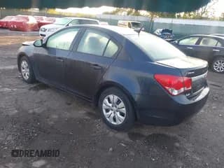 ✅ 2014 Chevrolet Cruze LS • VIN: 1G1PA5SG9E7198443 • Lot: 43258019. Listed on IAAI with 129,257 mi. Free auction sales archive from the USA and detailed vehicle history report at DreamBid. Image 3.
