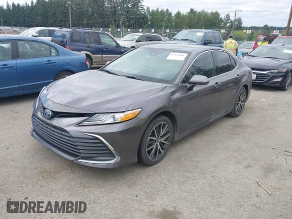 2022 Toyota Camry Hybrid XLE with VIN 4T1F31AK6NU575433, listed as a IAAI auction lot 42841689 with 65,526 mi miles and . Bid and sale history available at DreamBid. Image 18.