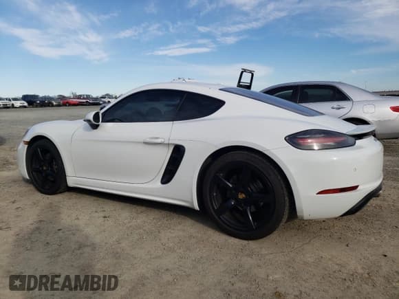 ✅ 2017 Porsche 718 Cayman • VIN: WP0AA2A81HS270209 • Lot: 87940065. Wystawiony na Copart z przebiegiem 127 160 mil. Bezpłatny archiwum sprzedaży aukcyjnych z USA i szczegółowy raport historii pojazdu na DreamBid. Zdjęcie 2.