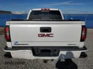 ✅ 2018 GMC Sierra 1500 Denali • VIN: 3GTU2PECXJG364575 • Лот: 66959835. Опубликован ранее на Copart с пробегом 248 452 миль. Бесплатный доступ к архиву аукционных продаж из США и подробный отчёт об истории автомобиля на DreamBid. Изображение 6.