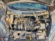 ✅ 2014 Ford Fiesta SE • VIN: 3FADP4EJ1EM200725 • Lot: 96177055. Wystawiony na Copart z przebiegiem 174 254 mil. Bezpłatny archiwum sprzedaży aukcyjnych z USA i szczegółowy raport historii pojazdu na DreamBid. Zdjęcie 11.