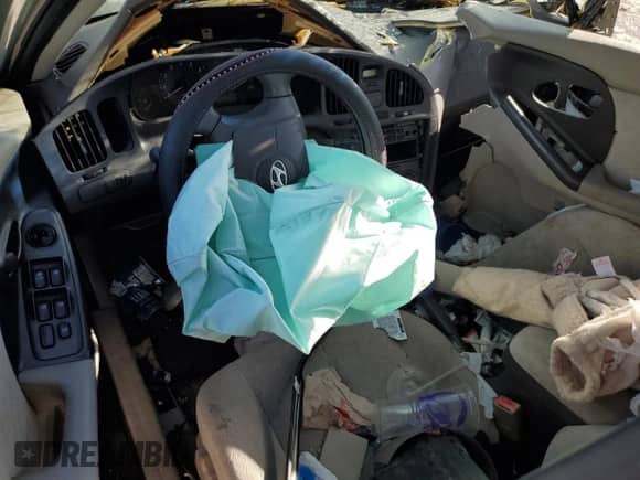 2004 Hyundai Elantra GLS z VIN KMHDN46D94U709721, wystawiony jako Copart lot #75496294 z przebiegiem Nie podano mil oraz Nie do naprawy • Non repairable. Historia ofert i sprzedaży dostępna na DreamBid. Obrazek 8.