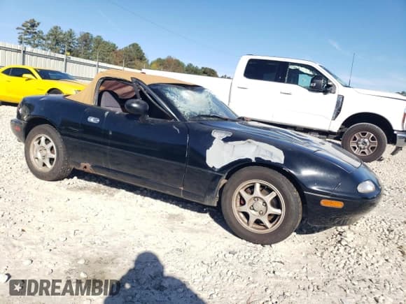 ✅ 1994 Mazda MX-5 Miata • VIN: JM1NA353XR0515267 • Lot: 77934764. Wystawiony na Copart z przebiegiem 153 218 mil. Bezpłatny archiwum sprzedaży aukcyjnych z USA i szczegółowy raport historii pojazdu na DreamBid. Zdjęcie 4.