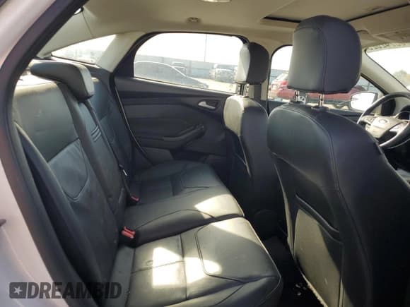 ✅ 2015 Ford Focus Titanium • VIN: 1FADP3J24FL274572 • Лот: 90742025. Опубликован ранее на Copart с пробегом 86 007 миль. Бесплатный доступ к архиву аукционных продаж из США и подробный отчёт об истории автомобиля на DreamBid. Изображение 10.