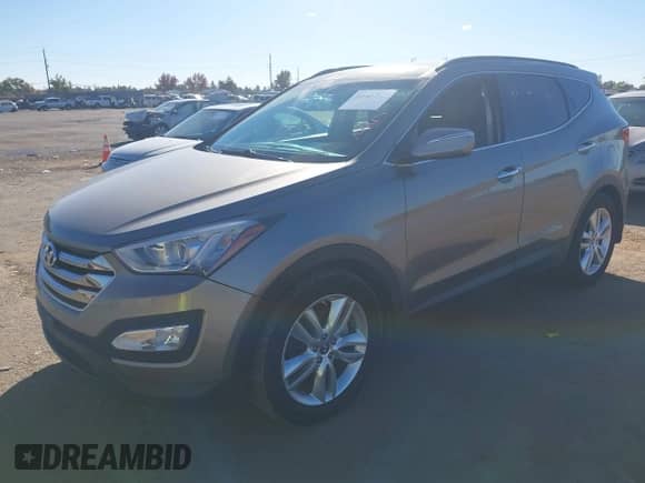 2015 Hyundai Santa Fe z VIN 5XYZWDLA9FG240216, wystawiony jako IAAI lot #43616955 z przebiegiem 203 691 mil mil oraz . Historia ofert i sprzedaży dostępna na DreamBid. Obrazek 17.
