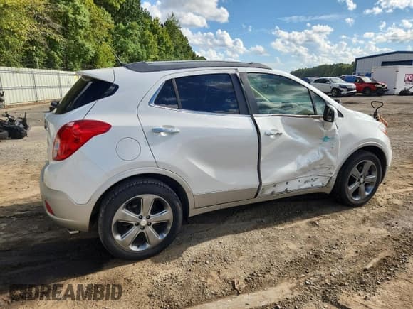 ✅ 2014 Buick Encore Premium • VIN: KL4CJDSB6EB777885 • Lot: 81757015. Listed on Copart with 68,546 mi. Free auction sales archive from the USA and detailed vehicle history report at DreamBid. Image 3.