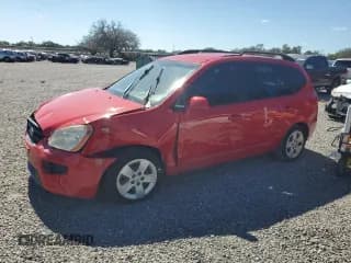 ✅ 2009 Kia Rondo LX • VIN: KNAFG528597224856 • Лот: 87378515. Опубликован ранее на Copart с пробегом 186 140 миль. Бесплатный доступ к архиву аукционных продаж из США и подробный отчёт об истории автомобиля на DreamBid. Изображение 1.