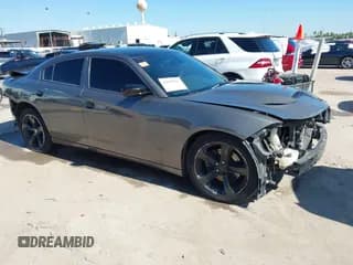 ✅ 2016 Dodge Charger R/T • VIN: 2C3CDXCT0GH237291 • Lot: 43607297. Listed on IAAI with 129,740 mi. Free auction sales archive from the USA and detailed vehicle history report at DreamBid. Image 1.