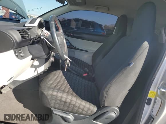 ✅ 2012 Scion iQ • VIN: JTNJJXB02CJ018629 • Lot: 91115535. Wystawiony na Copart z przebiegiem 73 261 mil. Bezpłatny archiwum sprzedaży aukcyjnych z USA i szczegółowy raport historii pojazdu na DreamBid. Zdjęcie 7.