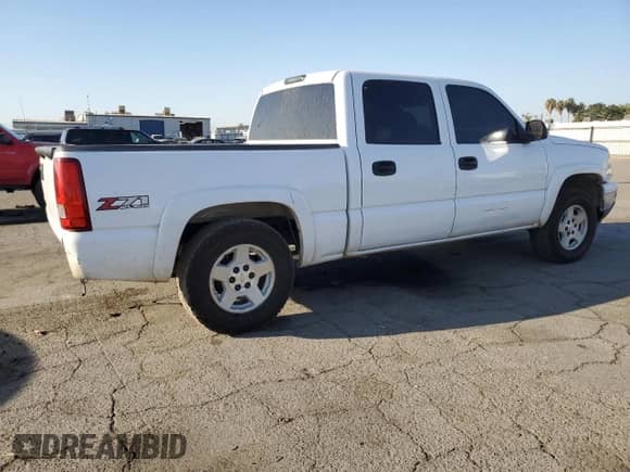 2006 Chevrolet Silverado 1500 LT1 with VIN 2GCEK13Z461295312, listed as a Copart auction lot 71477394 with 163,832 mi miles and Salvage title. Bid and sale history available at DreamBid. Image 3.