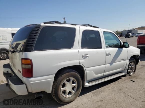 ✅ 2001 GMC Yukon Denali • VIN: 1GKEK63U61J186208 • Lot: 70895394. Listed on Copart with 207,395 mi. Free auction sales archive from the USA and detailed vehicle history report at DreamBid. Image 3.