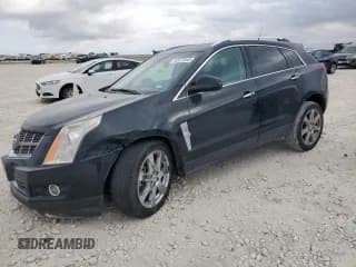 ✅ 2012 Cadillac SRX Performance Collection • VIN: 3GYFNEE39CS594753 • Lot: 92873555. Wystawiony na Copart z przebiegiem 151 617 mil. Bezpłatny archiwum sprzedaży aukcyjnych z USA i szczegółowy raport historii pojazdu na DreamBid. Zdjęcie 1.