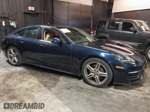 ✅ 2022 Porsche Panamera • VIN: WP0AJ2A79NL100211 • Лот: 41385875. Опубликован ранее на IAAI с пробегом 7 066 миль. Бесплатный доступ к архиву аукционных продаж из США и подробный отчёт об истории автомобиля на DreamBid. Изображение 1.