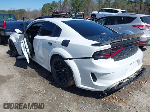 ✅ 2020 Dodge Charger Scat Pack • VIN: 2C3CDXGJ1LH202374 • Lot: 41763052. Listed on IAAI with 54,316 mi. Free auction sales archive from the USA and detailed vehicle history report at DreamBid. Image 3.
