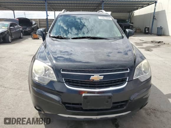 2014 Chevrolet Captiva Sport LTZ с VIN 3GNAL4EK9ES521013, выставлен на аукционе Copart как лот 71877004 с пробегом 79 918 миль миль и Списание • Salvage title. История ставок и продаж доступна на DreamBid. Изображение 5.