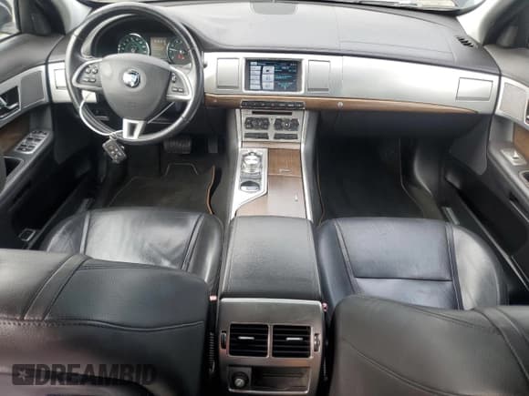 ✅ 2014 Jaguar XF SC • VIN: SAJWJ0EF1E8U14032 • Lot: 82426255. Listed on Copart with 98,353 mi. Free auction sales archive from the USA and detailed vehicle history report at DreamBid. Image 8.