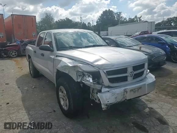 2010 Dodge Dakota Bighorn/Lonestar z VIN 1D7CW3GK0AS175803, wystawiony jako Copart lot #73672824 z przebiegiem Nie podano mil oraz Szkoda całkowita • Salvage title. Historia ofert i sprzedaży dostępna na DreamBid. Obrazek 11.