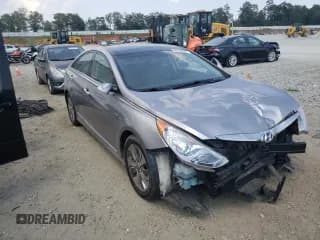 ✅ 2014 Hyundai Sonata • VIN: KMHEC4A40EA104569 • Lot: 63165624. Listed on Copart with 143,543 mi. Free auction sales archive from the USA and detailed vehicle history report at DreamBid. Image 4.