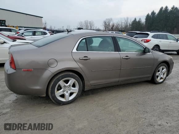 ✅ 2011 Chevrolet Malibu 1LS • VIN: 1G1ZB5E14BF164909 • Lot: 84567644. Listed on Copart with 110,756 mi. Free auction sales archive from the USA and detailed vehicle history report at DreamBid. Image 3.
