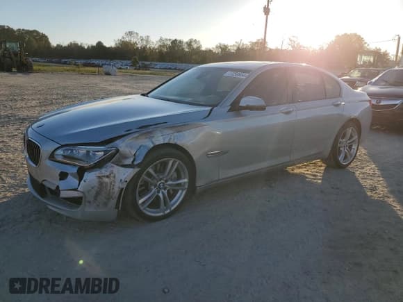 ✅ 2015 BMW 7 Series 750i • VIN: WBAYA8C53FGK19778 • Lot: 77258684. Listed on Copart with 34,535 mi. Free auction sales archive from the USA and detailed vehicle history report at DreamBid. Image 1.