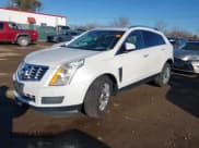 ✅ 2015 Cadillac SRX Luxury Collection • VIN: 3GYFNBE37FS509413 • Лот: 43675749. Опубликован ранее на IAAI с пробегом 98 803 миль. Бесплатный доступ к архиву аукционных продаж из США и подробный отчёт об истории автомобиля на DreamBid. Изображение 2.