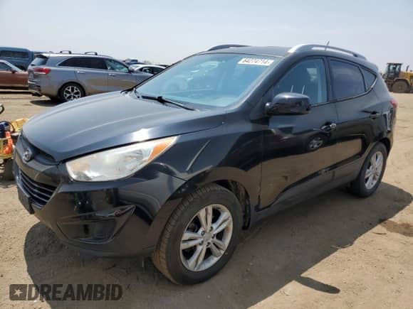 2011 Hyundai Tucson GLS z VIN KM8JUCAC9BU156922, wystawiony jako Copart lot #64274714 z przebiegiem 101 631 mil mil oraz Szkoda całkowita • Salvage title. Historia ofert i sprzedaży dostępna na DreamBid. Obrazek 1.
