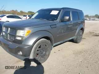 2011 Dodge Nitro Heat z VIN 1D4PU4GK0BW605964, wystawiony jako IAAI lot #43522651 z przebiegiem 153 648 mil mil oraz . Historia ofert i sprzedaży dostępna na DreamBid. Obrazek 2.