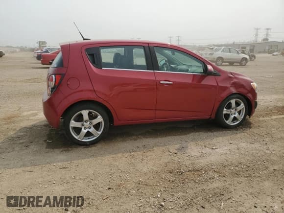 ✅ 2012 Chevrolet Sonic LTZ • VIN: 1G1JE6SH7C4111176 • Lot: 59002575. Listed on Copart with 116,640 mi. Free auction sales archive from the USA and detailed vehicle history report at DreamBid. Image 3.